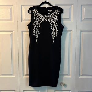 Calvin Klein black dress with white beading. New with tags.